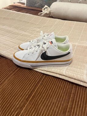 Nike White Sneakers with Black Swoosh and Tan Trim